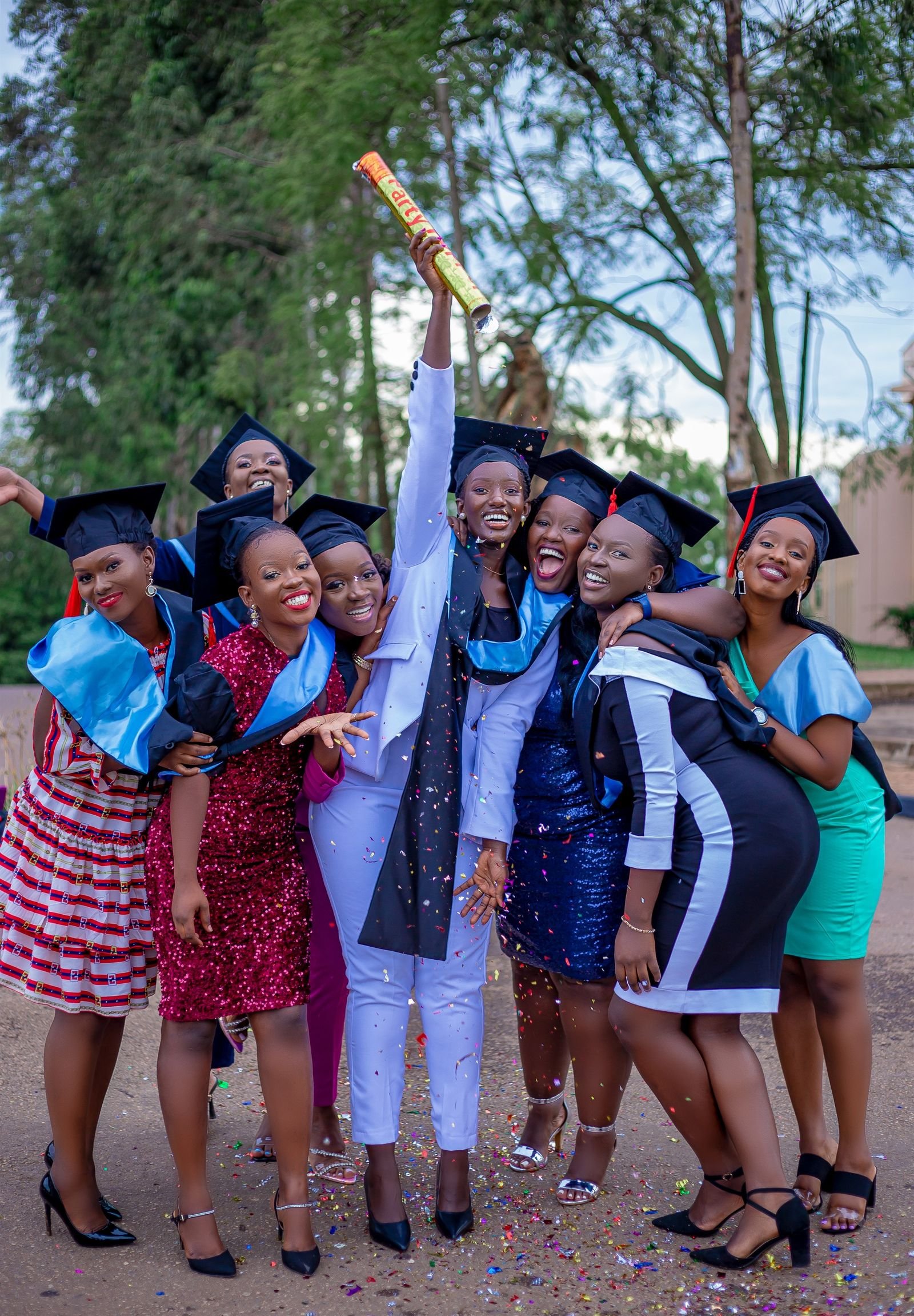 Graduates celebrating their certificates
